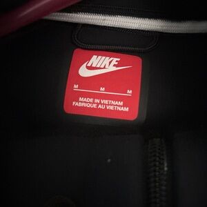 Nike Black Hoodie with Red Logo Patch
